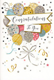 The photo presents a graceful congratulations card whose design captures the feeling of a quiet yet joyful celebration, like sharing good news over coffee near South Ruislip station. At the centre, a cheerful arrangement of illustrated balloons rises upwards, forming a loose bouquet of rounded shapes that overlap and blend as if floating gently on a breeze. The balloons are coloured in a harmonious palette of gold, silver, champagne, blush pink, sky blue, and soft grey, each one carefully shaded to appear softly luminous. Delicate detailing covers their surfaces: fine stripes, tiny stars, and scattered speckles that resemble glitter catching the light, subtly suggesting texture and festivity. From the base of the cluster, slender ribbons in drawn gold and silver trail down in playful curls, echoing the elegant ribbons a florist might tie around a celebratory bouquet. A central banner glides across the middle of the card, bearing the phrase Congratulations To You in flowing script, the lettering poised and welcoming. All around, the pale background is animated with dainty metallic stars, curling streamers, and little confetti dots, giving the impression of movement and lightness, as if the celebration has just begun. The card appears to have a smooth surface with slightly raised, shimmering accents that would feel pleasing to run your fingers over. Overall, it radiates warmth, admiration, and joy, making it an ideal companion to fresh flowers for exam results, promotions, or any proud achievement being celebrated in South Ruislip.